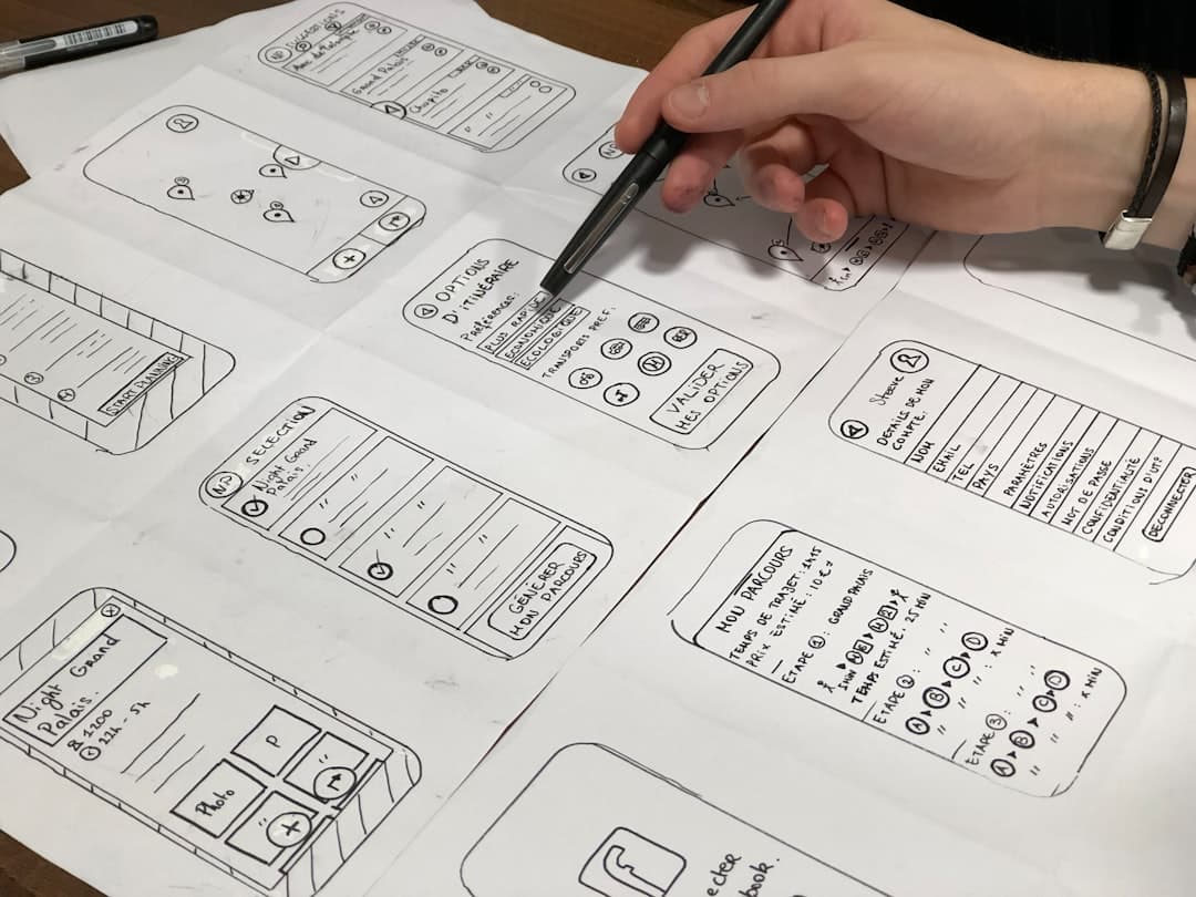 services-02 person-holding-pen-near-paper-sv8ooqaub-o